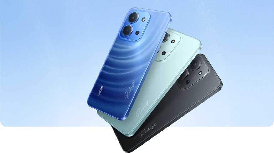 Widok na tylną obudowę telefonów Redmi 15C w trzech wariantach kolorystycznych: niebieskim, zielonym i czarnym.