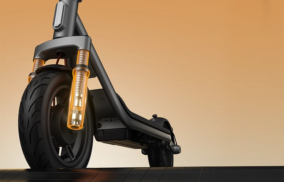 Zbliżenie na przednie zawieszenie Xiaomi Electric Scooter 6 Lite podkreślające amortyzację